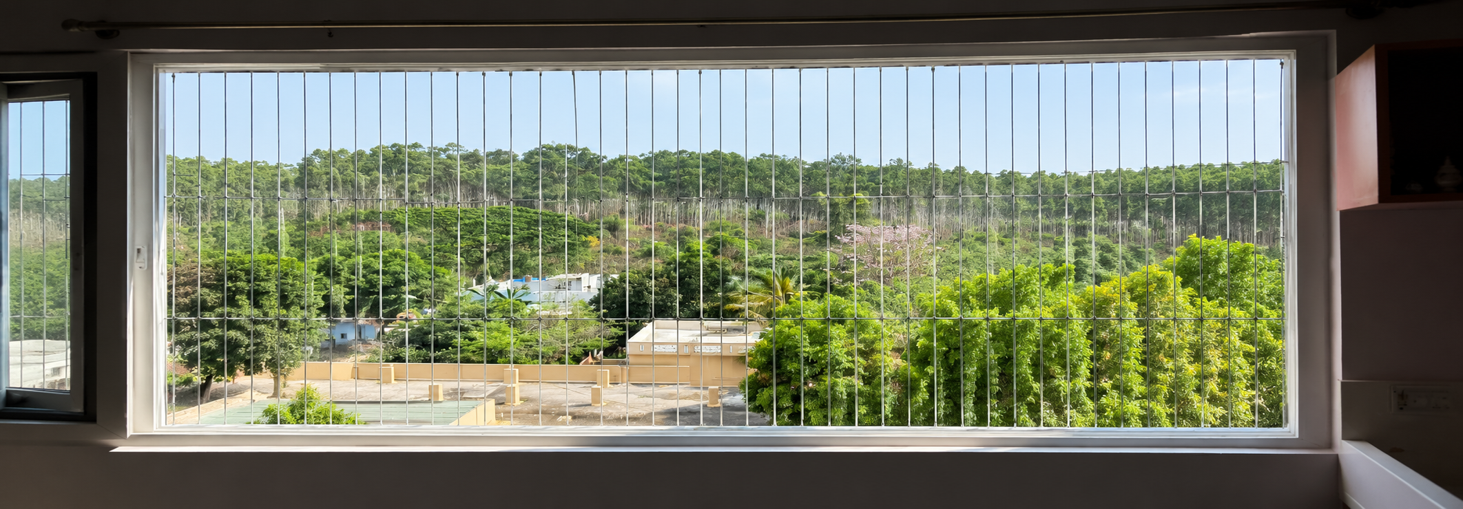 Invisible Grill for Windows in Chennai by SNK Pigeon Nets for secure windows with clear views